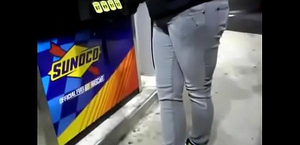  desperate girl wetting pee jeans while pumping gas